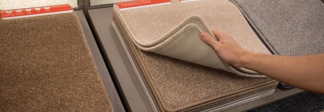 A close up shot of carpet stands, including coloured and grey ranges arranged interestingly.